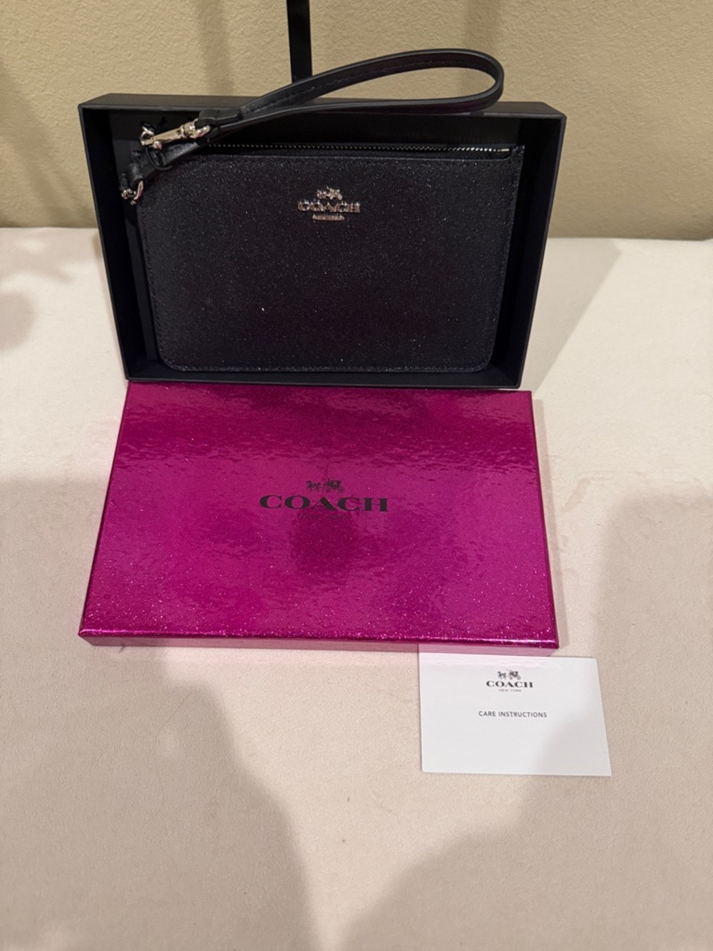 Coach Black Glitter Zip Wristlet with Gold Logo